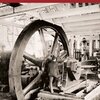 The cover of The Archaeology of Craft and Industry features an old photo of a wheel.